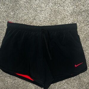 Nike Women's Black Shorts with Red Accents
